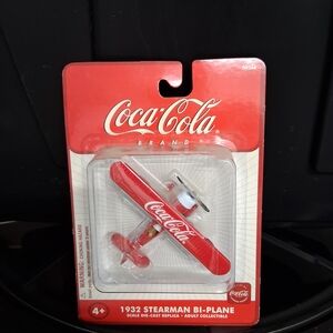 Coca-Cola Collectible Packaging with Black and White Design